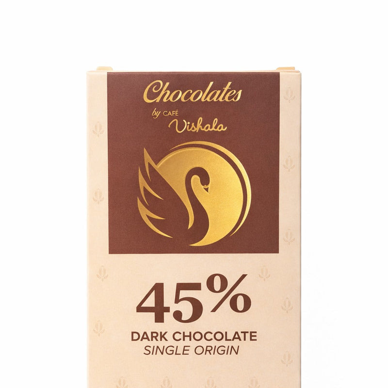 Box of Chocolates by Cafe Vishaka dark chocolate bar on a white background